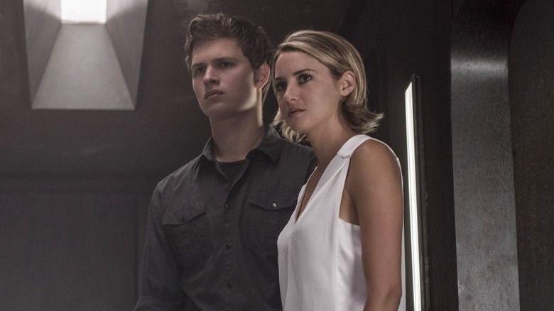 Caleb next to Tris