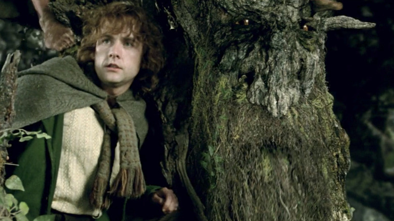 LOTR Pippin rides on Treebeard's shoulder