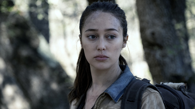 Alicia standing outside among trees in "Fear the Walking Dead."