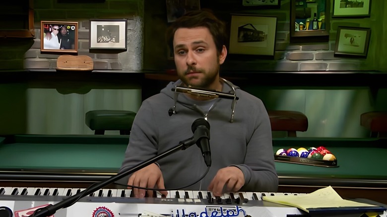 Charlie sitting behind a keyboard