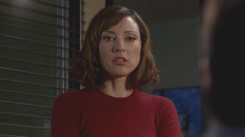 Lola Glaudini stands at door in Criminal Minds