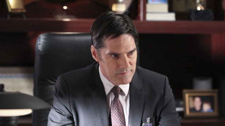 Aaron Hotchner sits at his desk