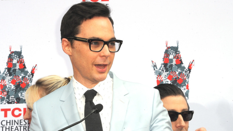 Jim Parsons speaks at podium