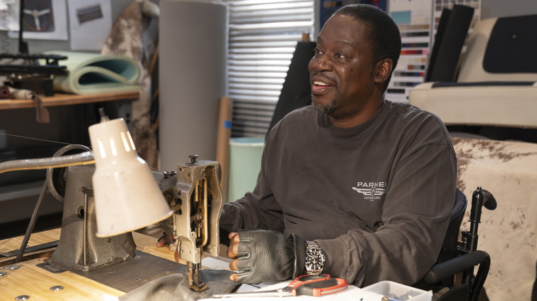 Ed sitting at his desk in Shifting Gears