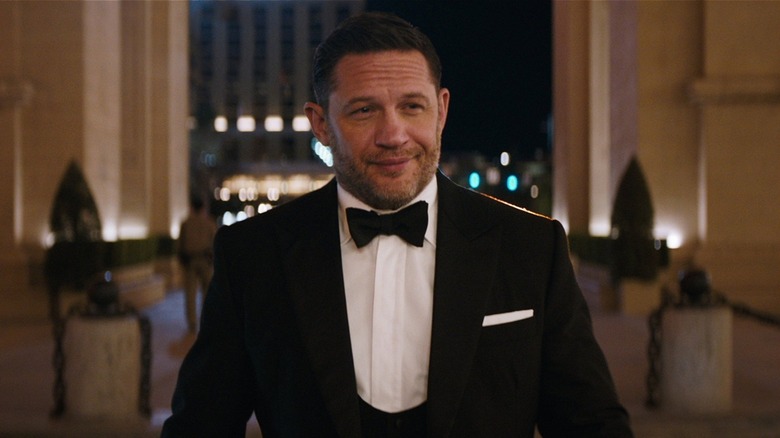 Eddie Brock smirking in tux