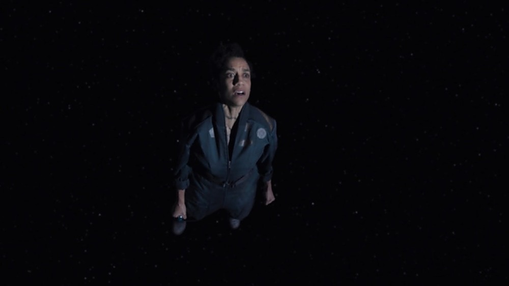 Naomi Nagata floats through space