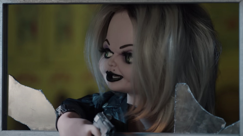 Tiffany looking out shattered window in Season 2 of Chucky