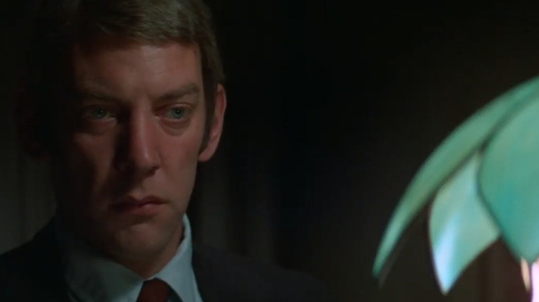 Donald Sutherland looking down