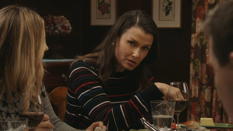 Bridget Moynahan explaining things during dinner