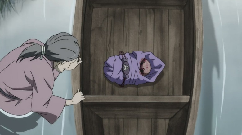 The baby is set adrift by the midwife in Dororo