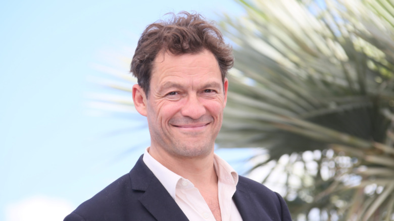 Actor Dominic West smiling