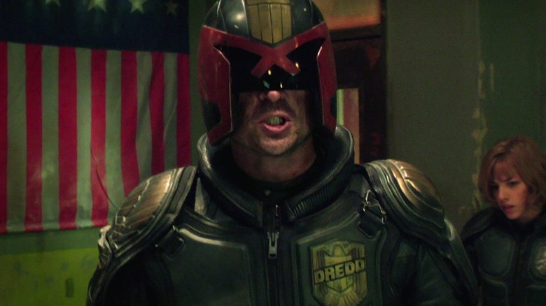 Dredd in front of flag