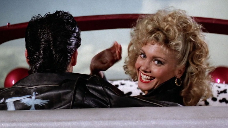 Grease couple in flying car