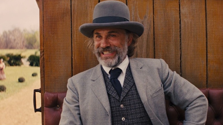 Christoph Waltz forcing a hard smile