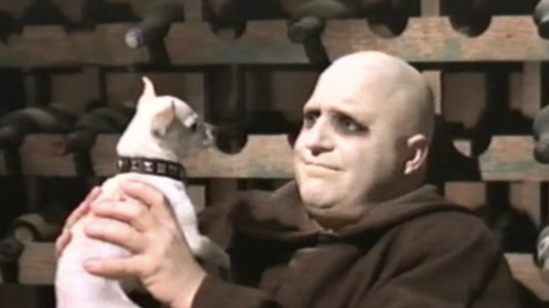 Fester holding dog