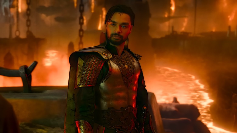 Xenk Yandar in armor surrounded by flames