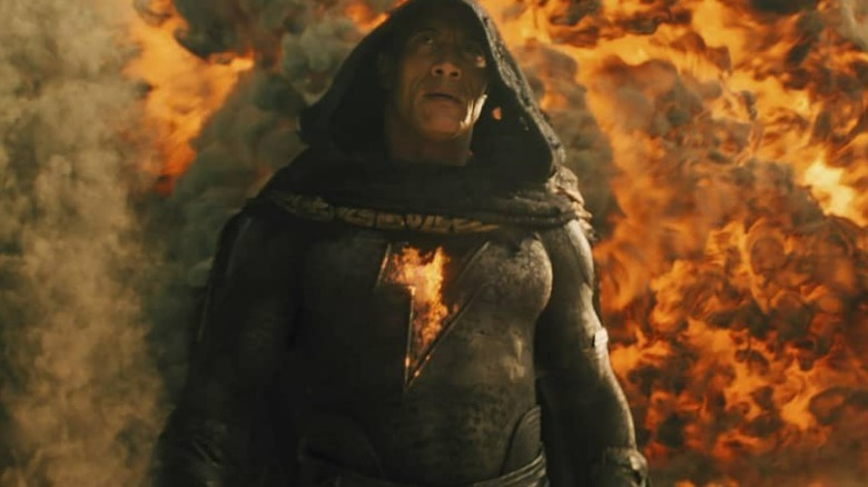 Black Adam walking away from an explosion