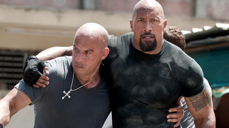 Dominic Toretto helping Luke Hobbs