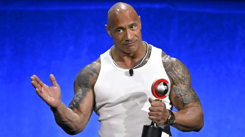 Dwayne Johnson wearing white tanktop