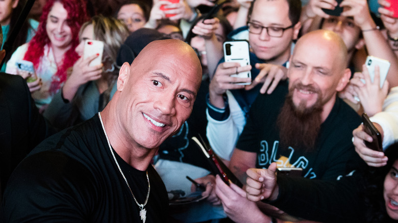 Dwayne Johnson with fans