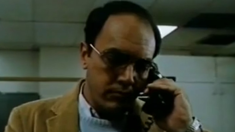 George DiCenzo uses a telephone