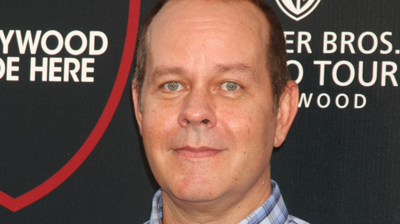 James Michael Tyler smiles