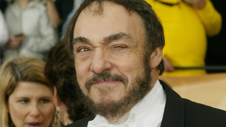 John Rhys-Davies winks