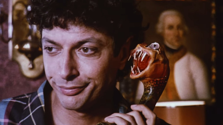 Jeff Goldblum with a snake phone