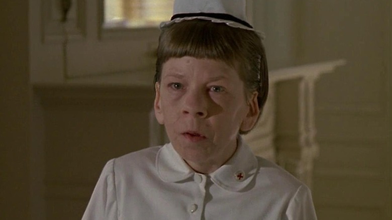 Linda Hunt as a nurse