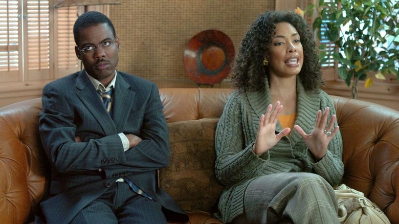 Chris Rock and Gina Torres on couch