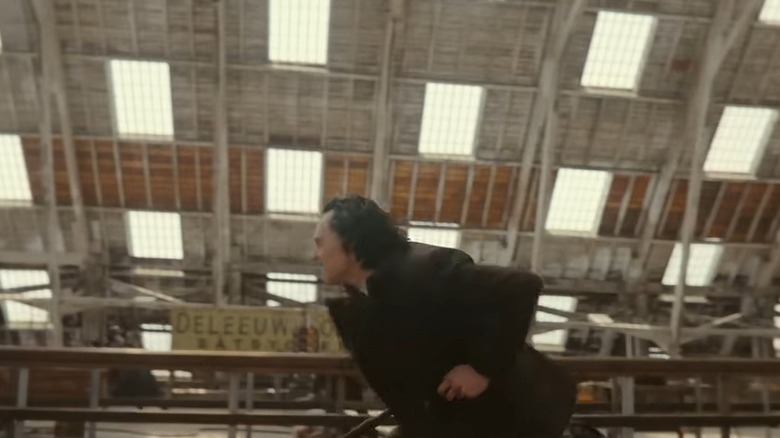 Loki fighting in boatyard