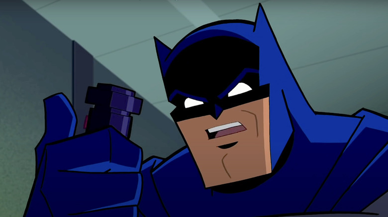 Batman holding a detonator