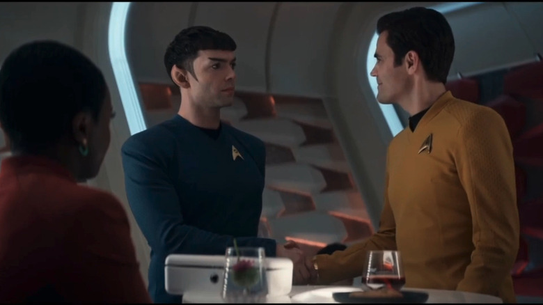 Kirk and Spock shake hands