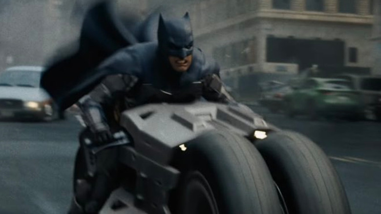 Batman rides a motorcycle