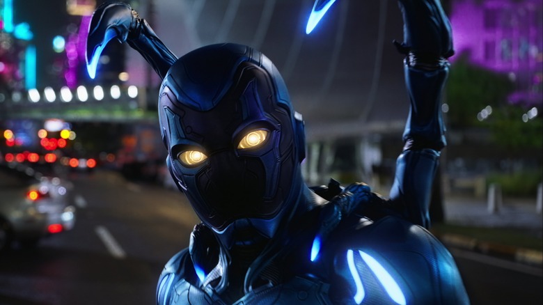 Blue Beetle looks at the camera