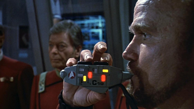 Yeoman Burke plays a boatswain's whistle in Star Trek VI