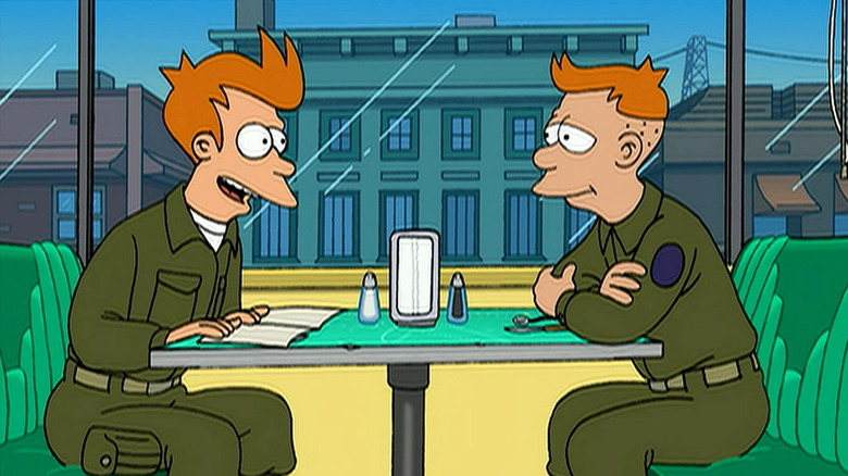 Fry talks to Enis at a diner