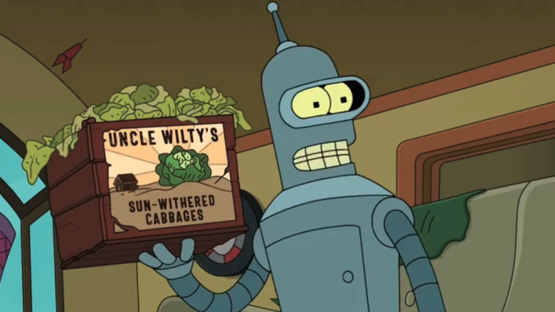 Bender holds a crate of cabbages