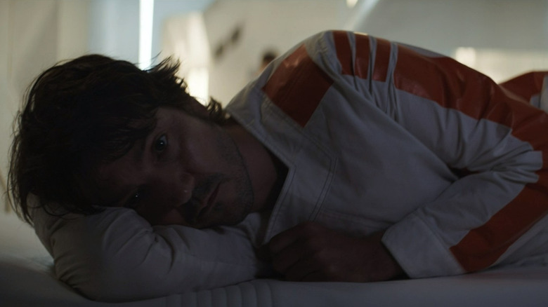 Cassian Andor lying in bed