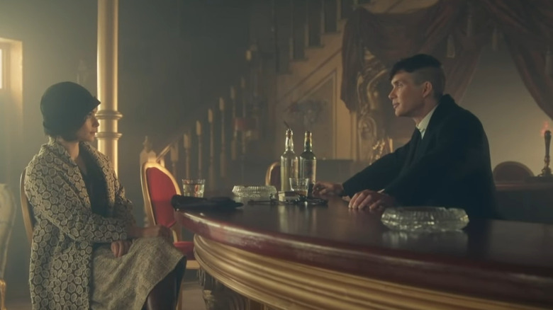 Cillian Murphy as Tommy Shelby behind the bar