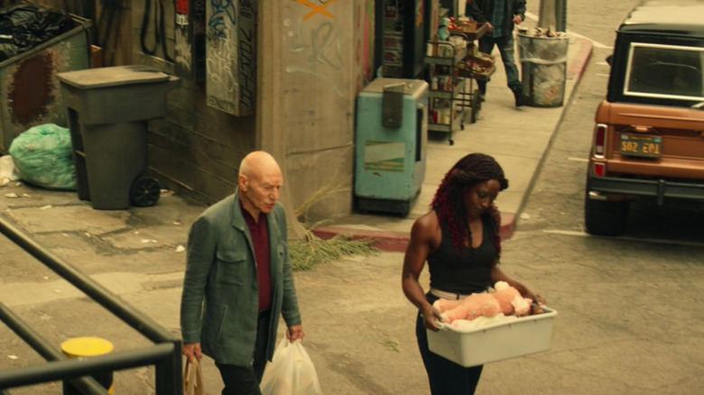 Picard and Guinan walk down the street