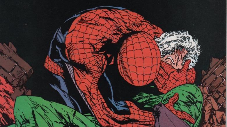 Spider-Man holding Captain Stacy in a comic cover