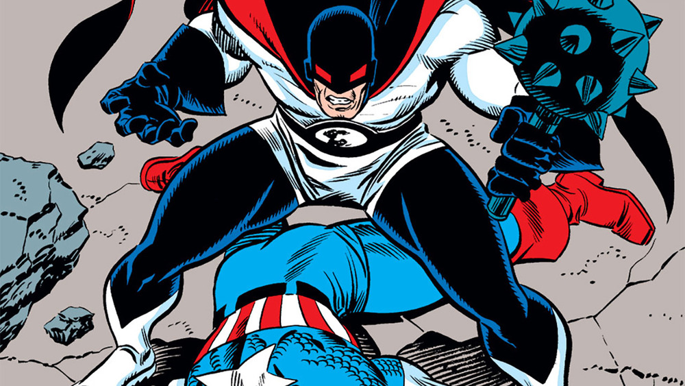 Flag Smasher stands over Captain America