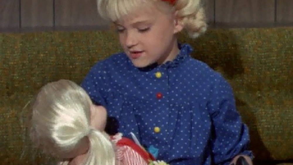 Cindy Brady holding Kitty Karry-All