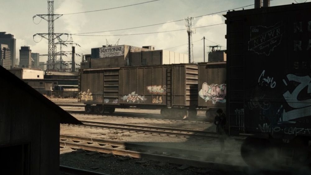 Barry Allen walks through a trainyard