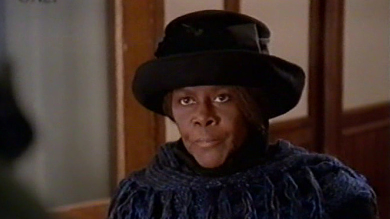 Cicely Tyson as Ms. Scrooge scours