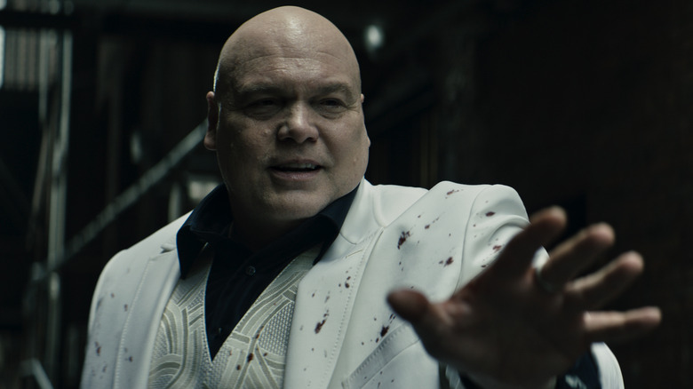 Kingpin holding out hand