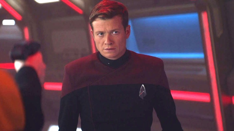 Jack Crusher in Starfleet uniform, looking suspicious