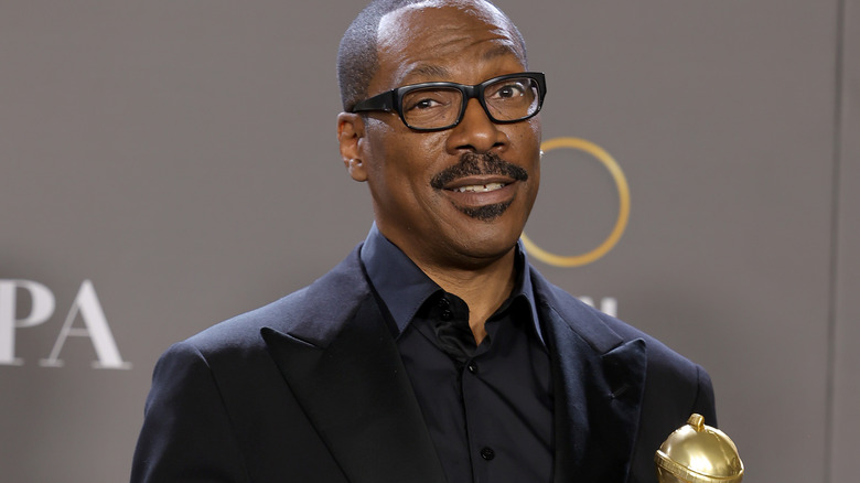 Eddie Murphy Holding Golden Globe