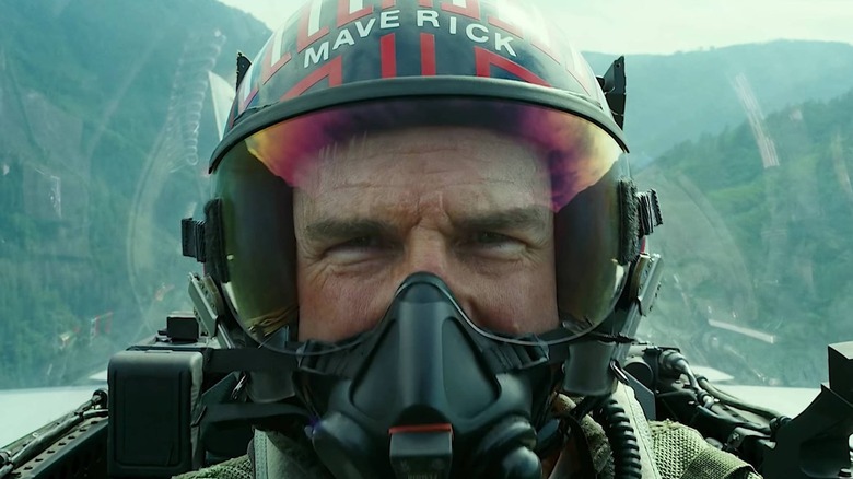 Tom Cruise as Maverick wearing pilot helmet